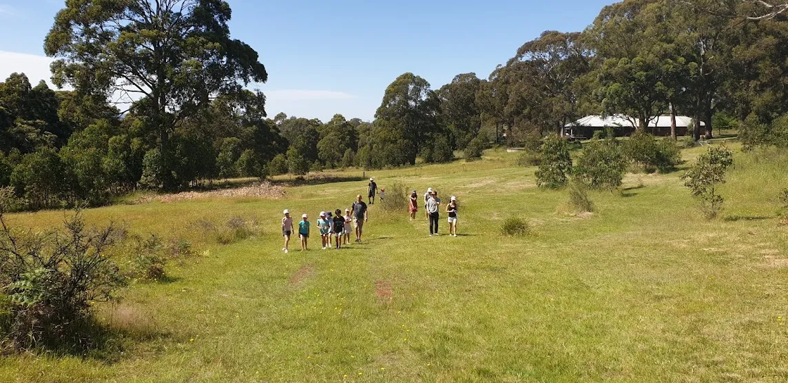 Family walking through paddock